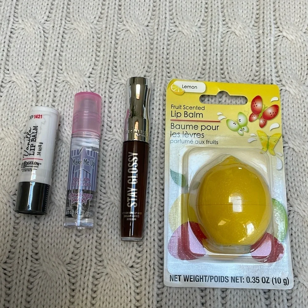 New Unused Lip gloss/balms lot of 4. Vanilla strawberry burst cocoa kiss lemon